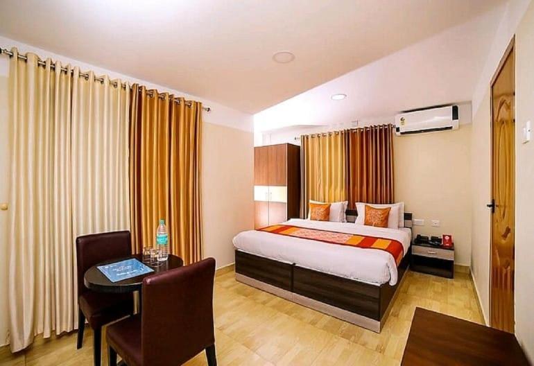 Hotel Tayas Trippapur Bagian luar foto